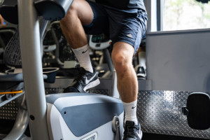 Man riding on exercise bike