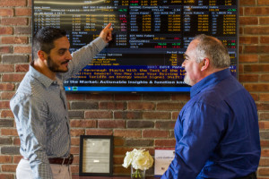Staff Photo Two men discussing work